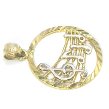 $550 14Kt Yellow Gold Diamond Cut Musical Note Charm